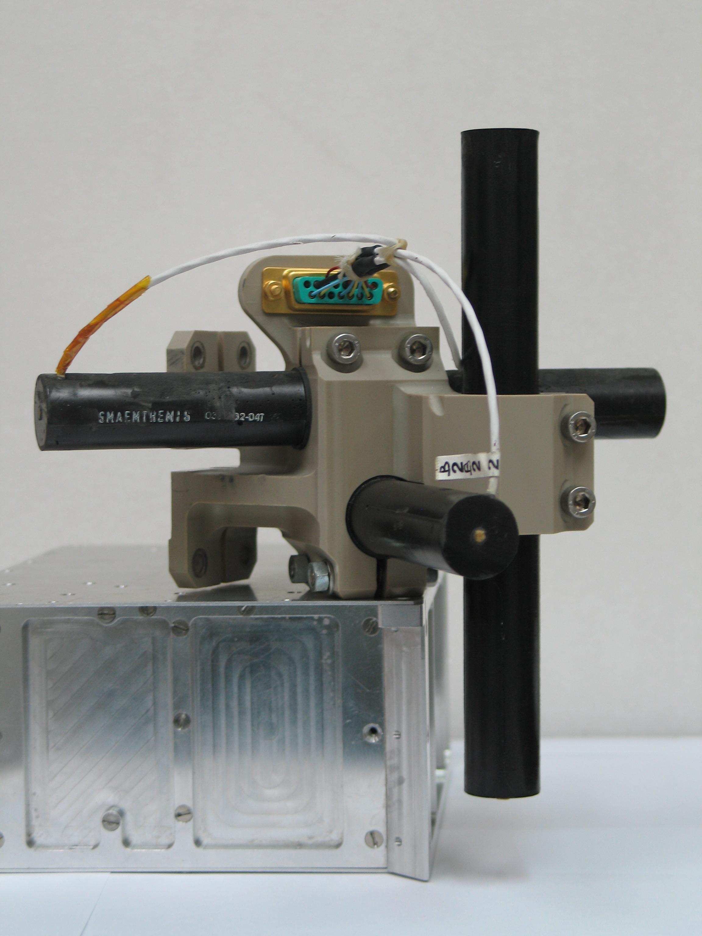 SCM tri-axial search coils with fixture and connector.